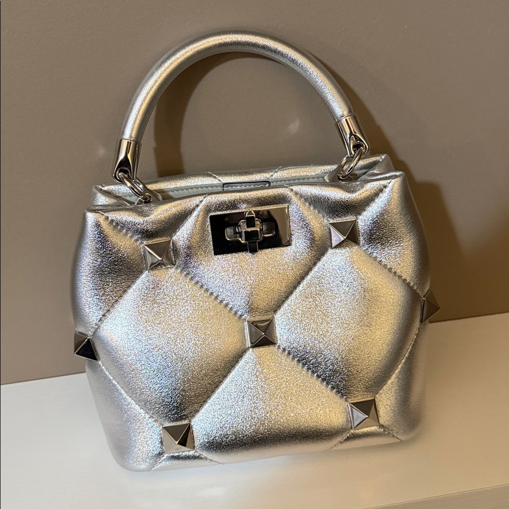 Valentino Garavani Small Roman Stud The Handle Bag in metallic silver